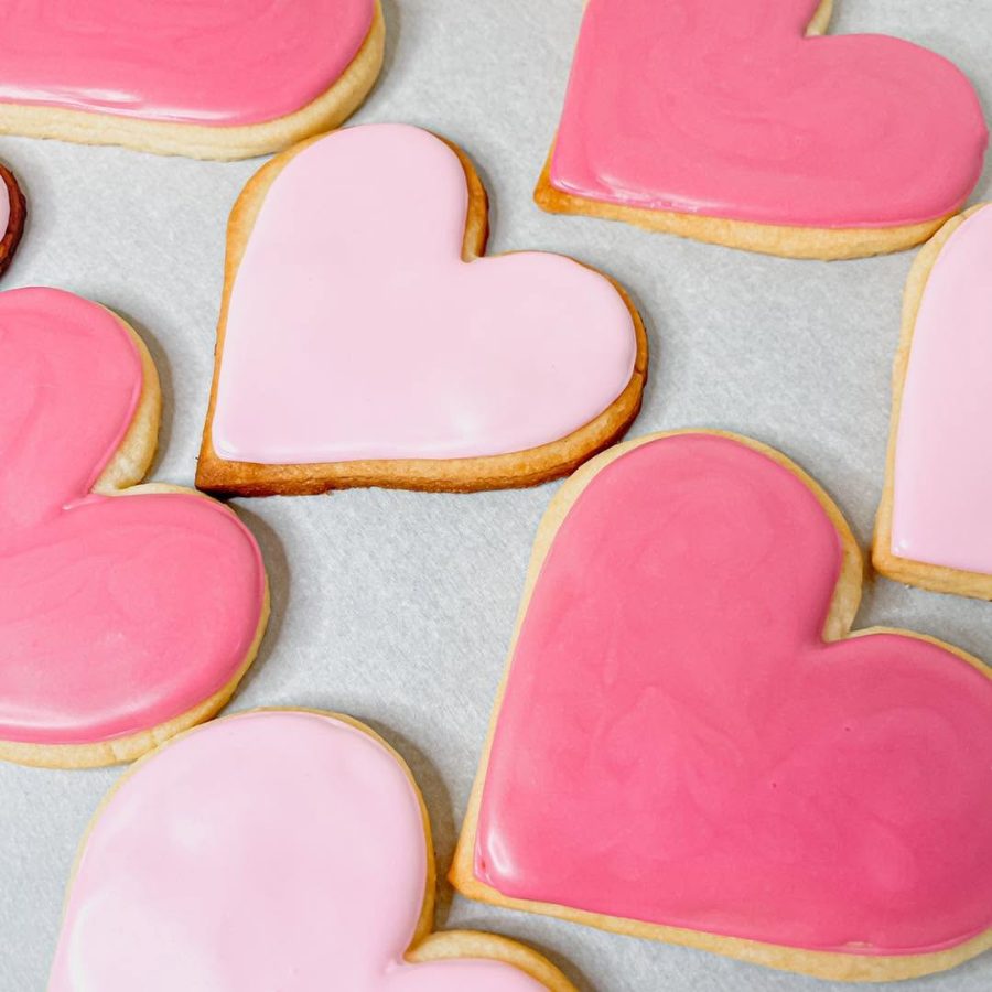 Cakes & Bakes's own photograph: heart shaped shortbread cookies iced in pink.